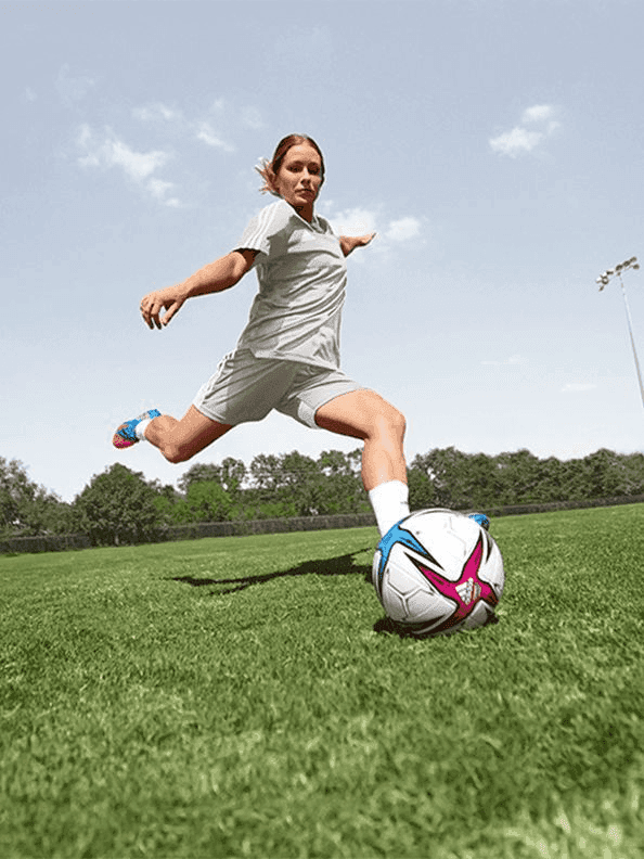 Elite player kicking soccer ball during advanced development session